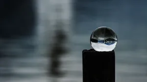 Caption: Mysterious Crystal Ball On Dark Table Wallpaper