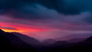 Caption: Mysterious Dark Mountain Under The Night Sky Wallpaper