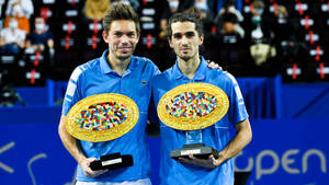 Caption: Nicolas Mahut Triumphantly Holding Montpellier Trophy Wallpaper