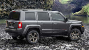 Caption: Off-road Adventure With Jeep Patriot Wallpaper