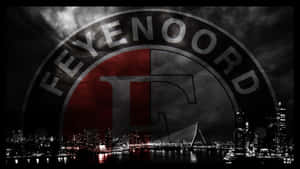 Caption: Passionate Feyenoord Fans Cheering At The Iconic Feyenoord Stadium. Wallpaper