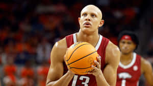 Caption: Pensive Business Leader - Jordan Walsh Wallpaper