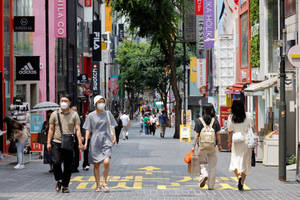 Caption: People In Medical Masks In A Crowd Wallpaper