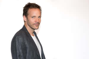 Caption: Peter Sarsgaard In Full Elegance. Wallpaper