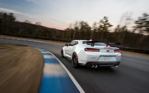 Caption: Power And Performance - The Newest Generation Camaro Muscle Car In Speed Test Wallpaper