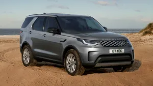 Caption: Powerful 2023 Land Rover Discovery Conquering The Off-road Landscapes Wallpaper