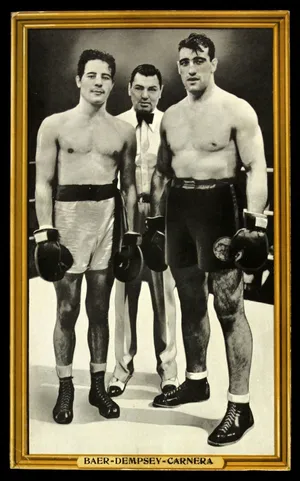 Caption: Primo Carnera, Max Baer, And Jack Dempsey At Historic Boxing Event Wallpaper