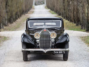 Caption: Pristine Bugatti Type 57 In Its Glory Wallpaper