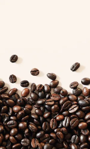 Caption: Quality Dark Roasted Coffee Beans Wallpaper
