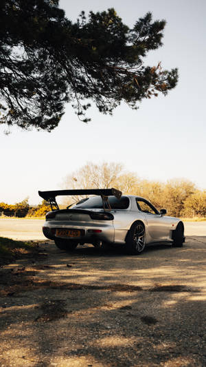 Caption: Racing Spirit – Rx7 Iphone Wallpaper Wallpaper