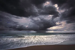 Caption: Refreshing Sea Breeze On A Sunny Day Wallpaper