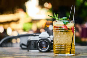 Caption: Refreshing Summer Drinks In A Tropical Setting Wallpaper