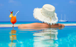 Caption: Relaxing Beach Holiday Escape Wallpaper