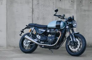 Caption: Retro Motorcycle - A Symmetry Of Power And Style Wallpaper