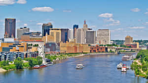 Caption: Riverside View Of Downtown Saint Paul, United States Wallpaper