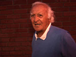 Caption: Robert Loggia In Casual Attire Wallpaper