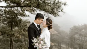 Caption: Romantic Couple Enjoying Sunset Together Wallpaper