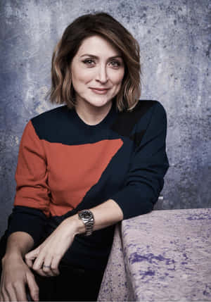 Caption: Sasha Alexander Posing Elegantly In A Photoshoot Wallpaper