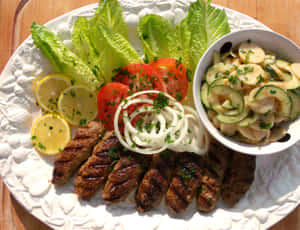 Caption: Scrumptious Cevapi Sausage With Salad Wallpaper