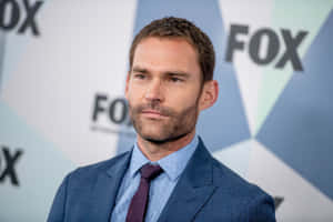 Caption: Seann William Scott Posing For A Photo Wallpaper