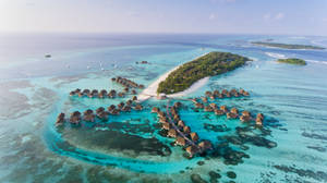 Caption: Serenity Unveiled At Club Med Kani, Maldives Wallpaper