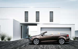 Caption: Shimmering Volkswagen Eos On A Scenic Drive Wallpaper