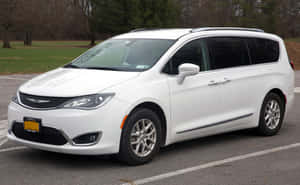 Caption: Sleek 2020 Chrysler Pacifica On The Road Wallpaper