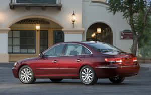 Caption: Sleek 2023 Hyundai Azera Luxury Sedan In Urban Setting Wallpaper