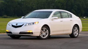 Caption: Sleek Acura Tl In Vibrant Blue Wallpaper