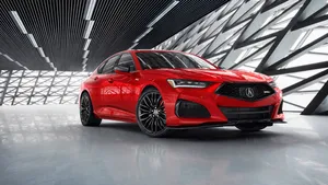 Caption: Sleek Acura Tlx Sedan In Action Wallpaper
