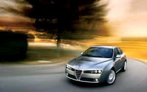 Caption: Sleek Alfa Romeo 159 Showcasing Italian Automotive Design Excellence Wallpaper