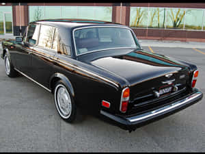 Caption: Sleek And Elegant Bentley T2 In Classic Design Wallpaper