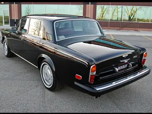 Caption: Sleek And Elegant Bentley T2 In Classic Design Wallpaper