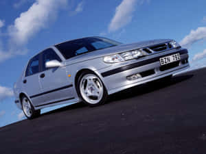 Caption: Sleek And Elegant Saab 9-5 Car Wallpaper