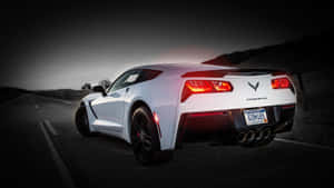 Caption: Sleek And Powerful Chevrolet Corvette C7 Wallpaper
