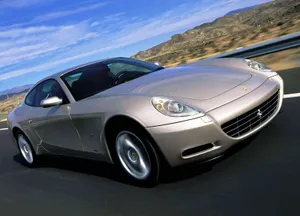 Caption: Sleek And Powerful Ferrari 612 Scaglietti In Action Wallpaper