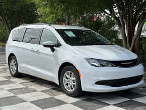 Caption: Sleek And Sophisticated Chrysler Voyager: Your Ultimate Family Vehicle Wallpaper