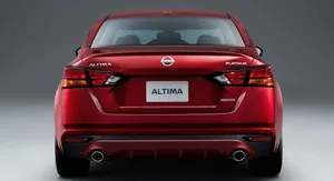 Caption: Sleek And Sophisticated Nissan Altima Wallpaper