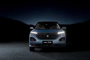 Caption: Sleek And Stylish Baojun On The Road Wallpaper