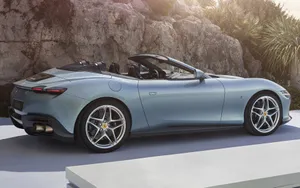 Caption: Sleek And Stylish Ferrari Roma On City Streets Wallpaper