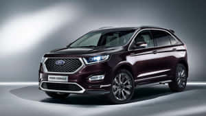 Caption: Sleek And Stylish Ford Edge In A Scenic Background Wallpaper