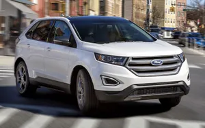 Caption: Sleek And Stylish Ford Edge On The Road Wallpaper
