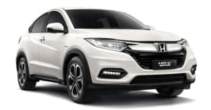 Caption: Sleek And Stylish Honda Hr-v On The Road Wallpaper