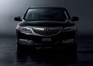 Caption: Sleek And Stylish Honda Legend In Motion Wallpaper