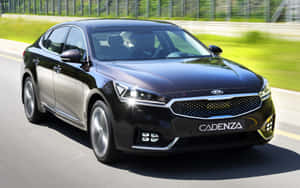 Caption: Sleek And Stylish Kia Cadenza On The Highway Wallpaper