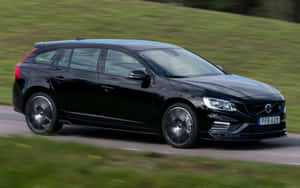 Caption: Sleek And Stylish Volvo V60 In Motion Wallpaper