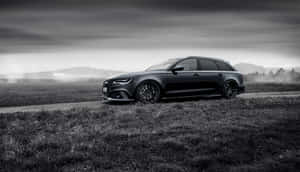 Caption: Sleek Audi Rs6 Showcasing Its Impressive Power And Design Wallpaper