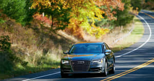 Caption: Sleek Audi S8 In A Striking Urban Setting Wallpaper