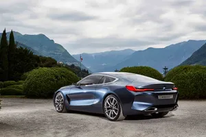 Caption: Sleek Bmw 8 Series In An Urban Setting Wallpaper