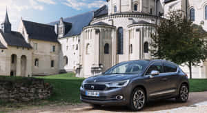 Caption: Sleek Citroen Ds4 In Urban Landscape Wallpaper